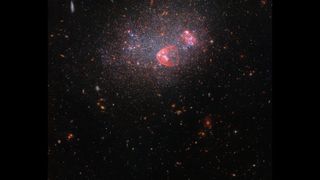 UGC 8091 is a dwarf irregular galaxy about 7 million light-years away from our solar system.
