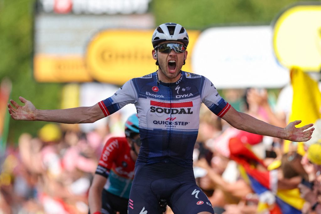 Soudal QuickSteps Danish rider Kasper Asgreen cycles to the finish line to win the 18th stage of the 110th edition of the Tour de France cycling race 184 km between Moutiers and BourgenBresse in the French Alps on July 20 2023 Photo by Thomas SAMSON AFP Photo by THOMAS SAMSONAFP via Getty Images