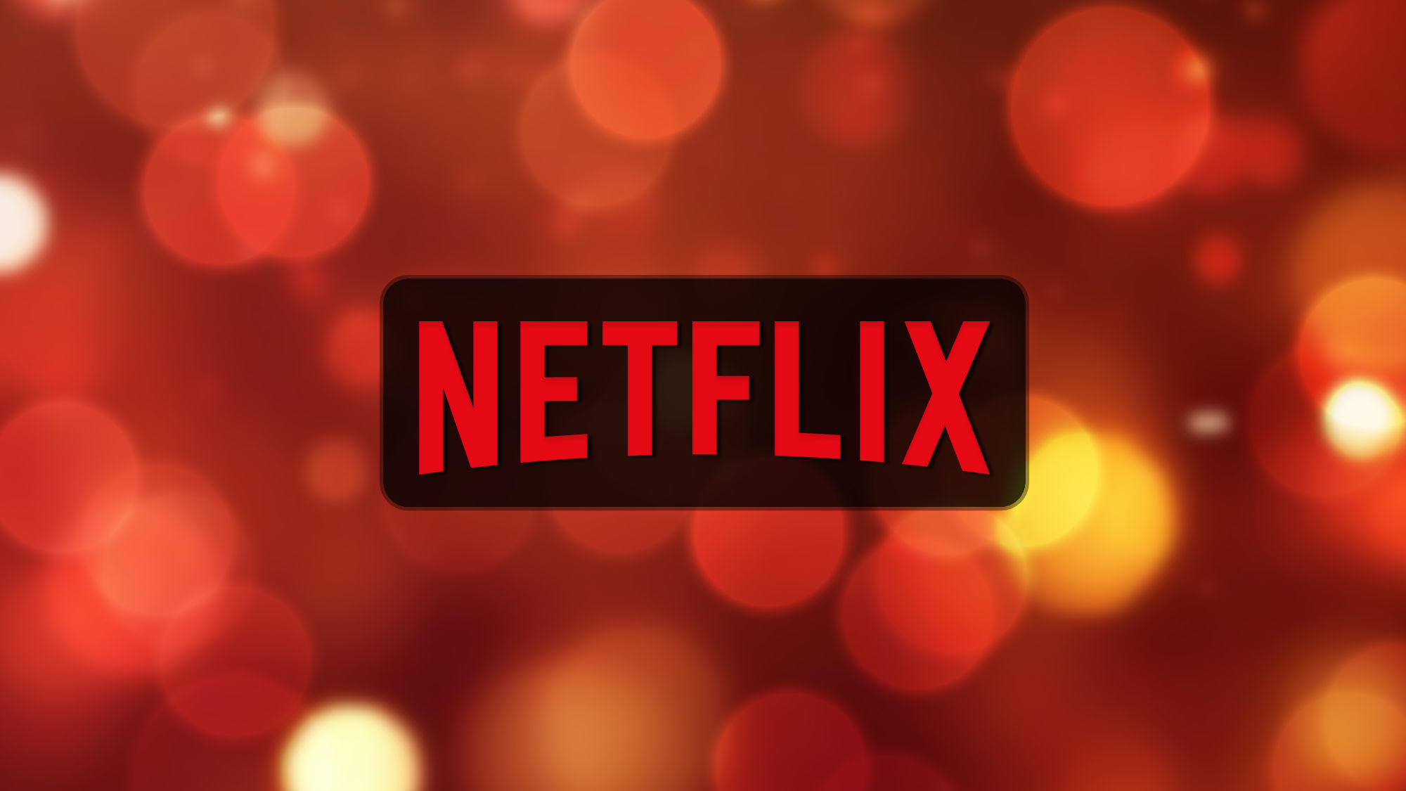 Netflix logo on an orange lights background
