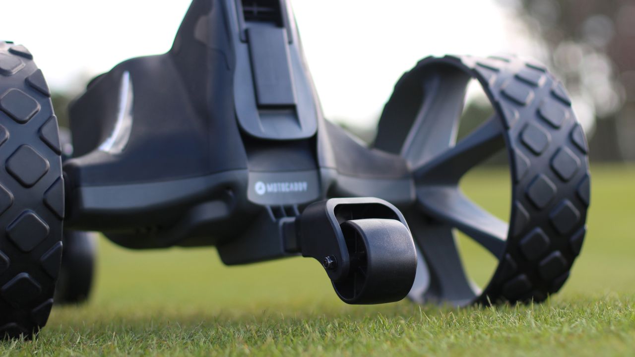 The anti-tip rear wheel on the Motocaddy M7 GPS