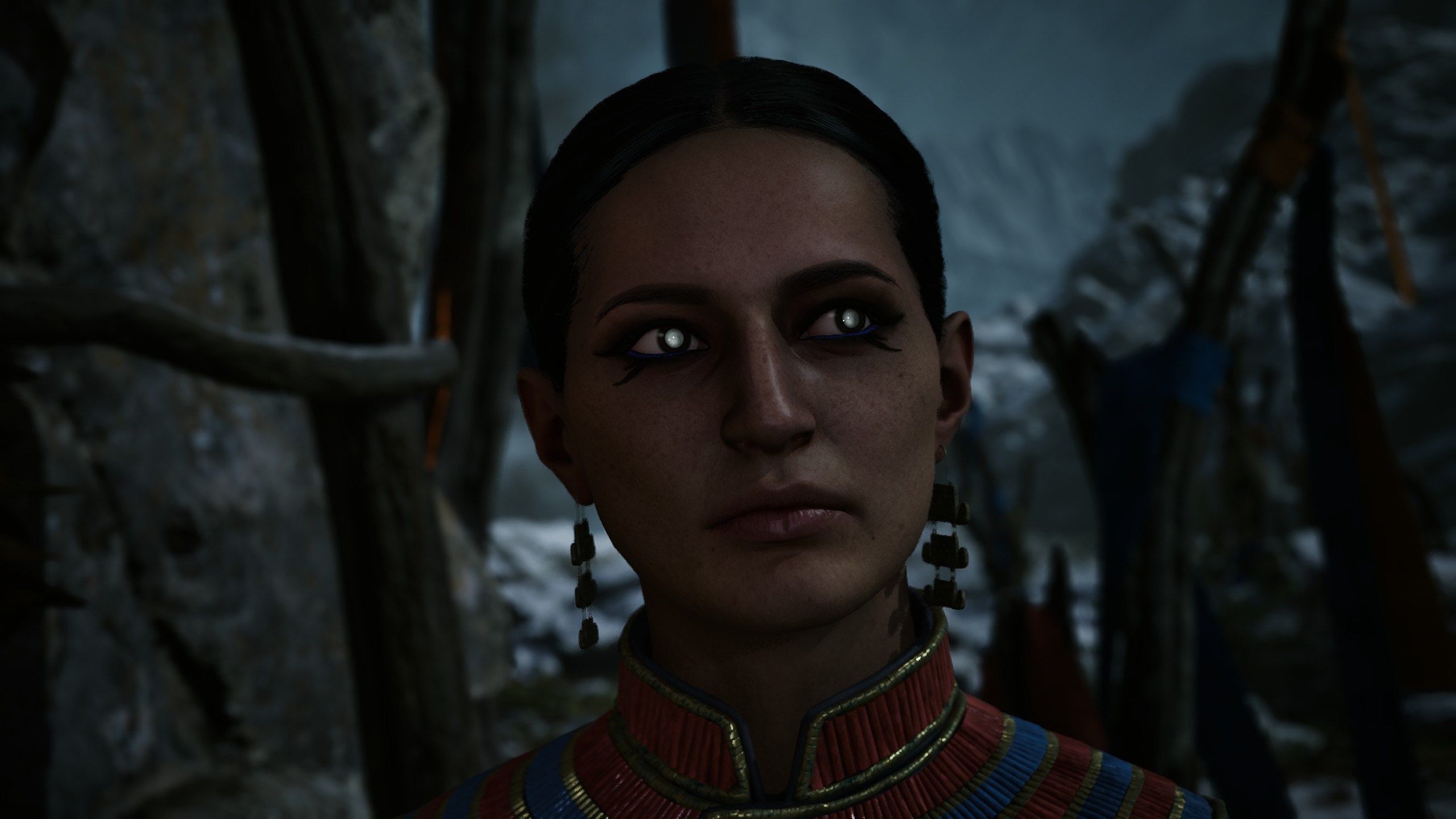 A woman with glowing white eyes