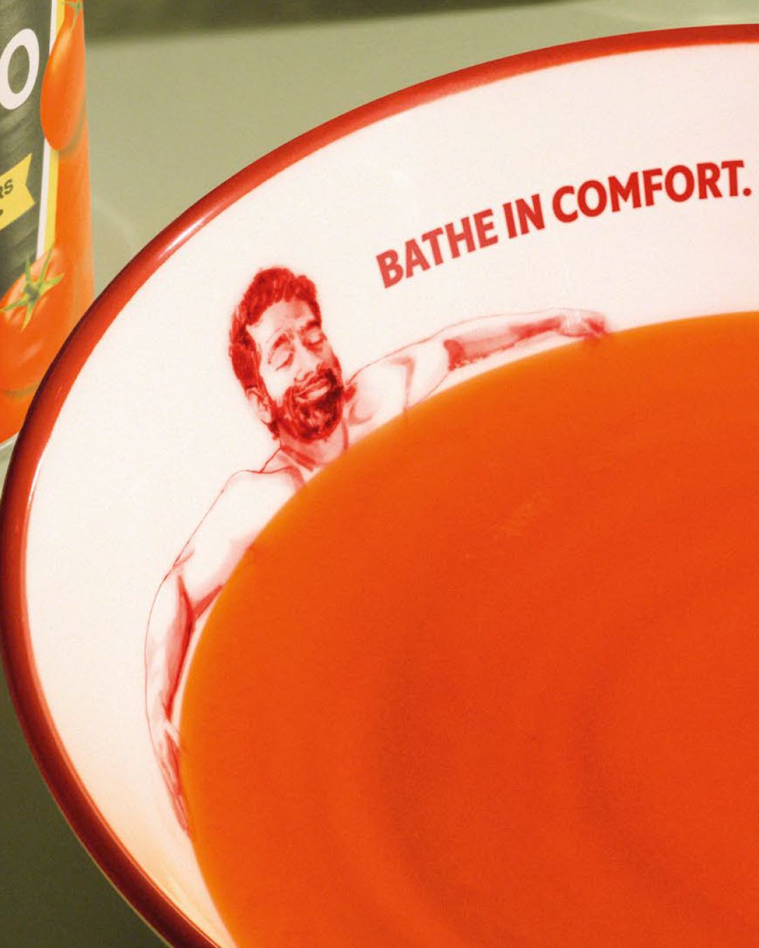 Heinz tomato soup campaign with illustrated people who look like they're having a bath in a bowl of soup