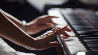 A person playing a piano.