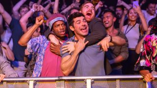 Jermaine Fowler, Zac Efron, and Andrew Santino having fun at a concert in Ricky Stanicky.
