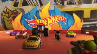 Several Hot Wheels sitting in the starting lineup of Hot Wheels Unleashed 2 - Turbocharged.
