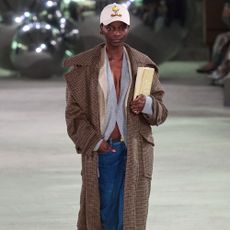 a model walks the runway at Copenhagen Fashion Week's fall/winter 2025 show