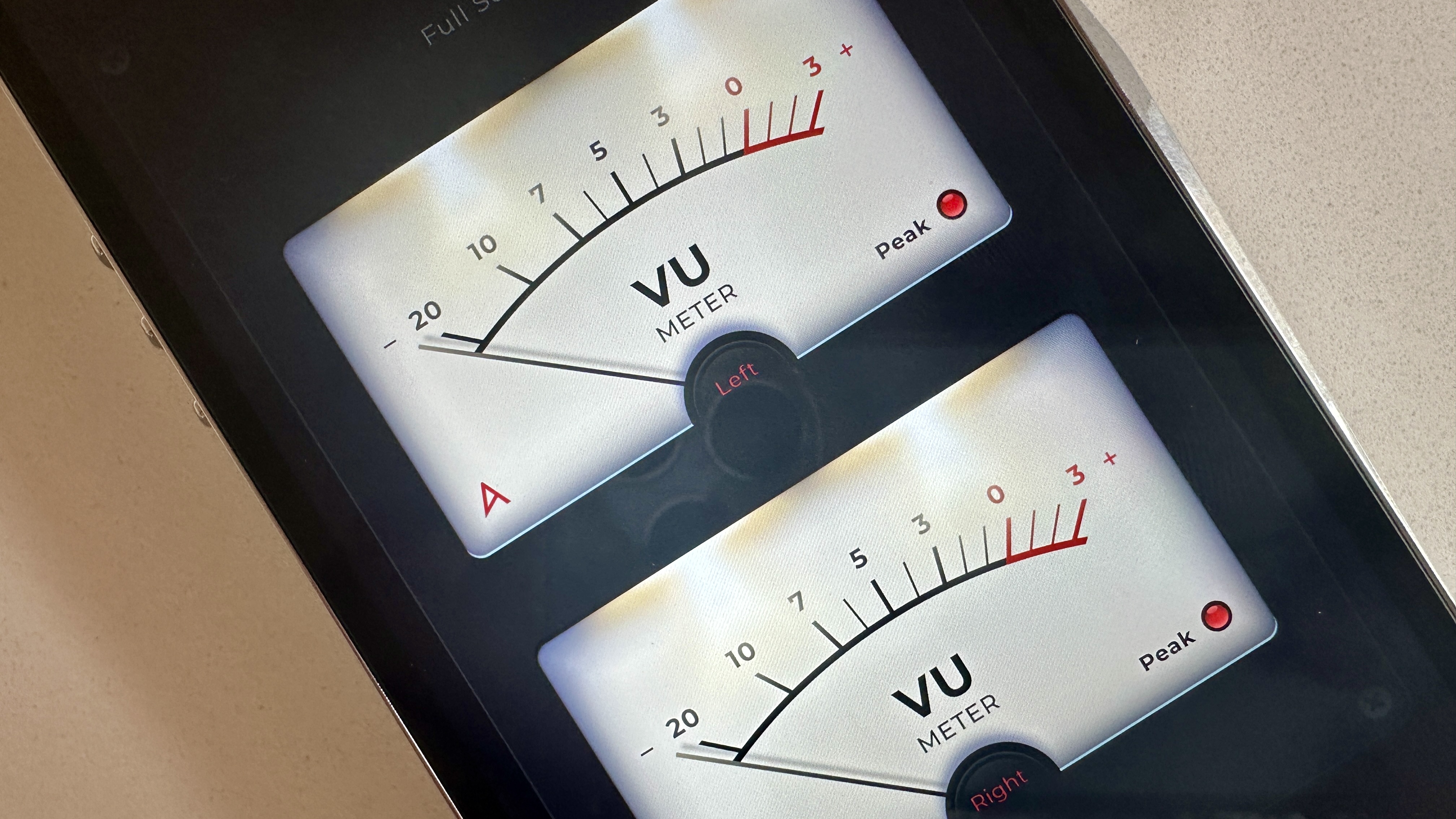 Astell &amp;amp; Kern A&amp;amp;ultima SP4000 digital audio player, showing VU meters, on a white surface