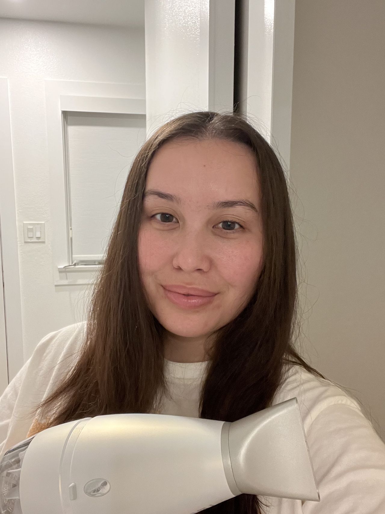 Catharine Malzahn with dry hair after testing Drybar Reserve Blow Dryer
