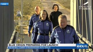 William Shatner leads astronauts and Amazon founder Jeff Bezos to Blue Origin's New Shepard spacecraft. 