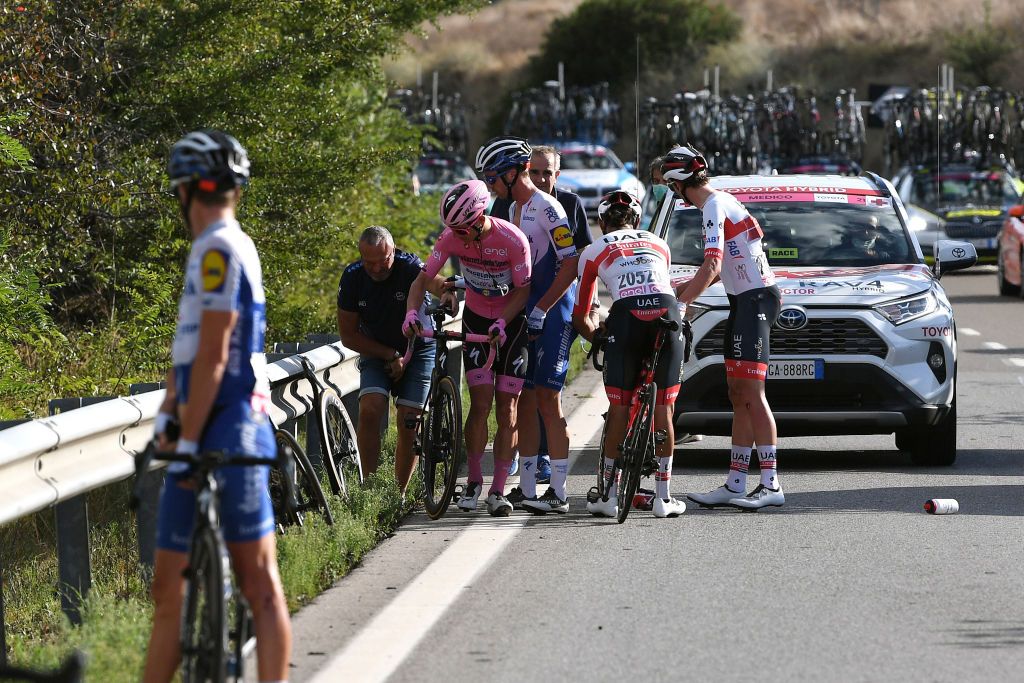 MATERA ITALY OCTOBER 08 Joao Almeida of Portugal and Team Deceuninck QuickStep Pink Leader Jersey Crash Alvaro Jose Hodeg Chagui of Colombia and Team Deceuninck QuickStep Fernando Gaviria Rendon of Colombia and UAE Team Emirates during the 103rd Giro dItalia 2020 Stage 6 a 188km stage from Castrovillari to Matera 401m girodiitalia Giro on October 08 2020 in Matera Italy Photo by Tim de WaeleGetty Images