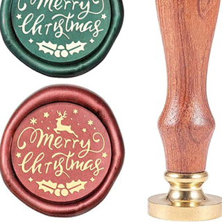 Wooden stamp with merry christmas wax seals