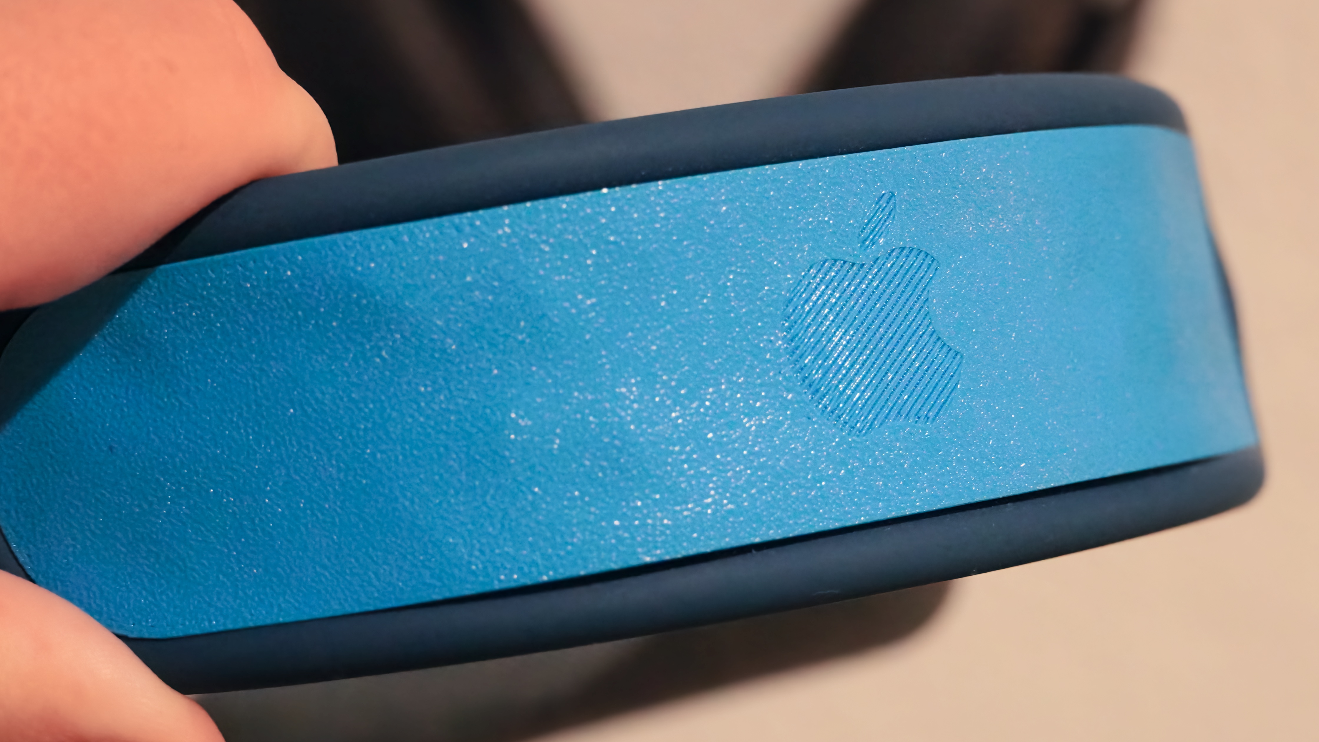 A headband insert for the AirPods Max made using a Bambu Lab A1 Mini printer.