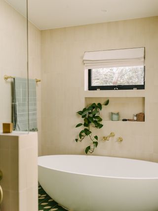 A minimalistic bathroom with a tub