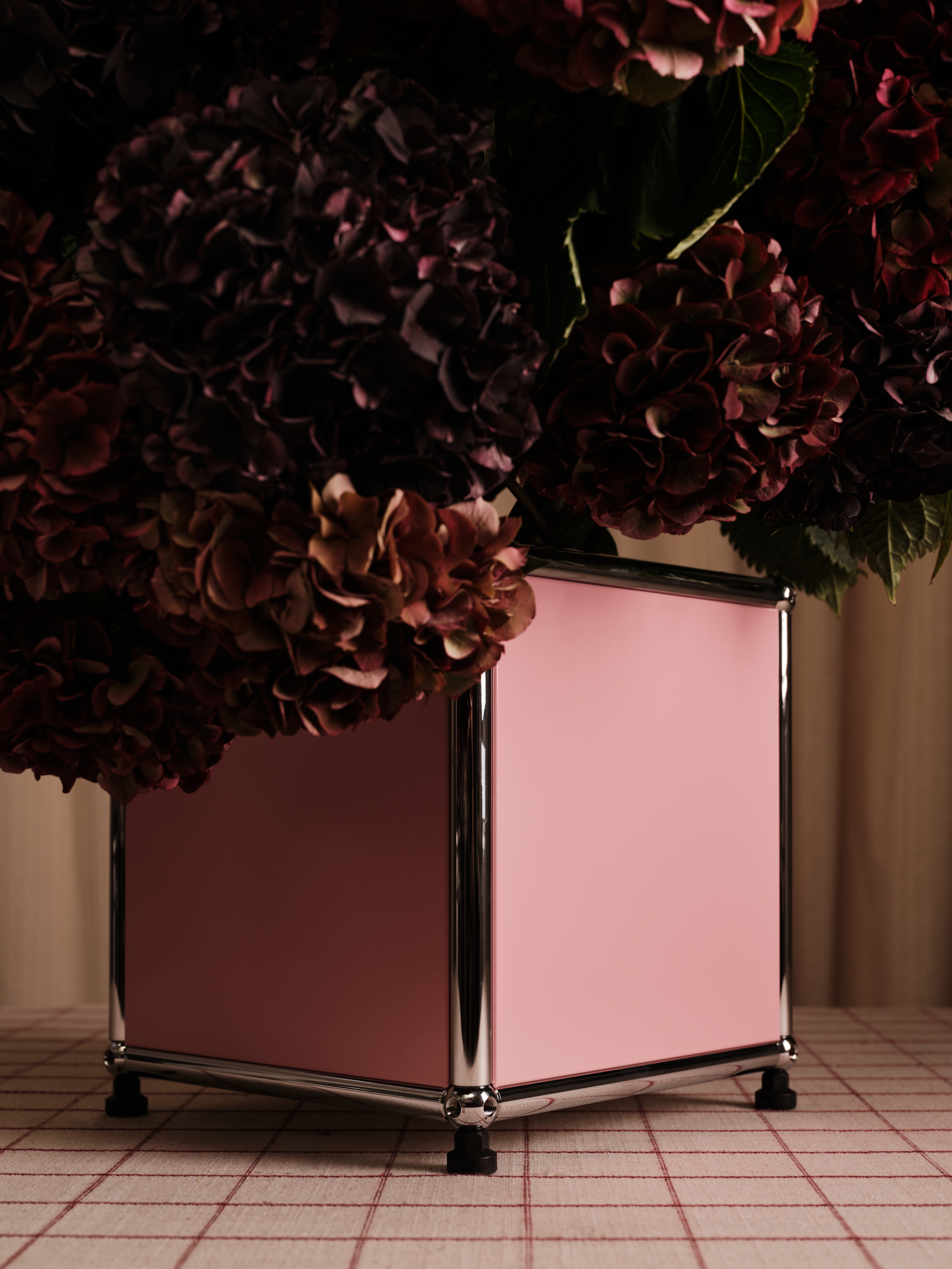 A series of shots depicting a festive Christmas tree, flowers, candles, and accessories setup.