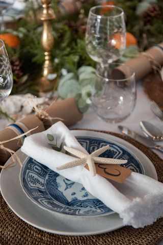 place setting with starfish napkin holder