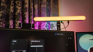 The Logitech Litra Beam LX key light set-up on a desk.