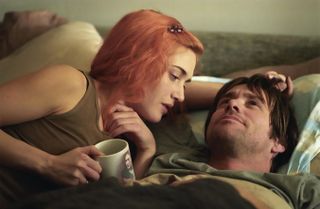 kate winslet with orange hair talks to jim carrey in bed in Eternal Sunshine of the Spotless Mind