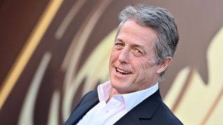 Hugh Grant attends the 2023 premiere of 'Wonka'