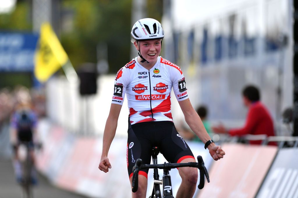 MAASMECHELEN BELGIUM OCTOBER 30 Fem Van Empel of The Netherlands and Team Pauwels Sauzen Bingoal celebrates at finish line as race winner during the 1st UCI Cyclocross World Cup Maasmechelen Womens Elite CXWorldCup on October 30 2022 in Maasmechelen Belgium Photo by Luc ClaessenGetty Images