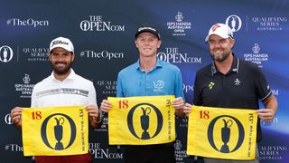 (L to R) Curtis Luck, Ryggs Johnston, and Marc Leishman hold up Open flags after qualifying for Royal Portrush in 2025