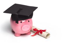 GRADUATE PIGGY BANK WEARING MORTAR BOARD WITH DIPLOMA