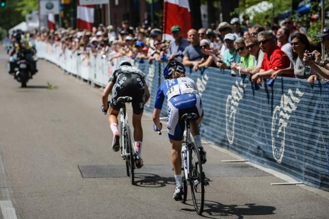 Katie Hall (UnitedHealthcare) follows Taylor Wiles (Specialized-Lululemon) past fans in the finish area