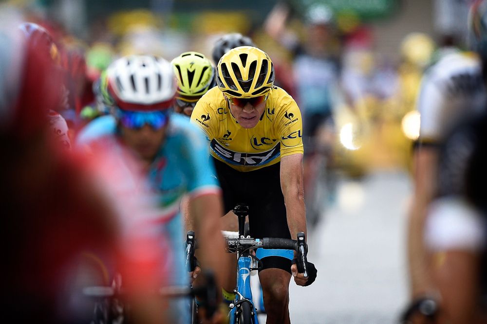 Chris Froome keeps an eye on the action during stage 4.