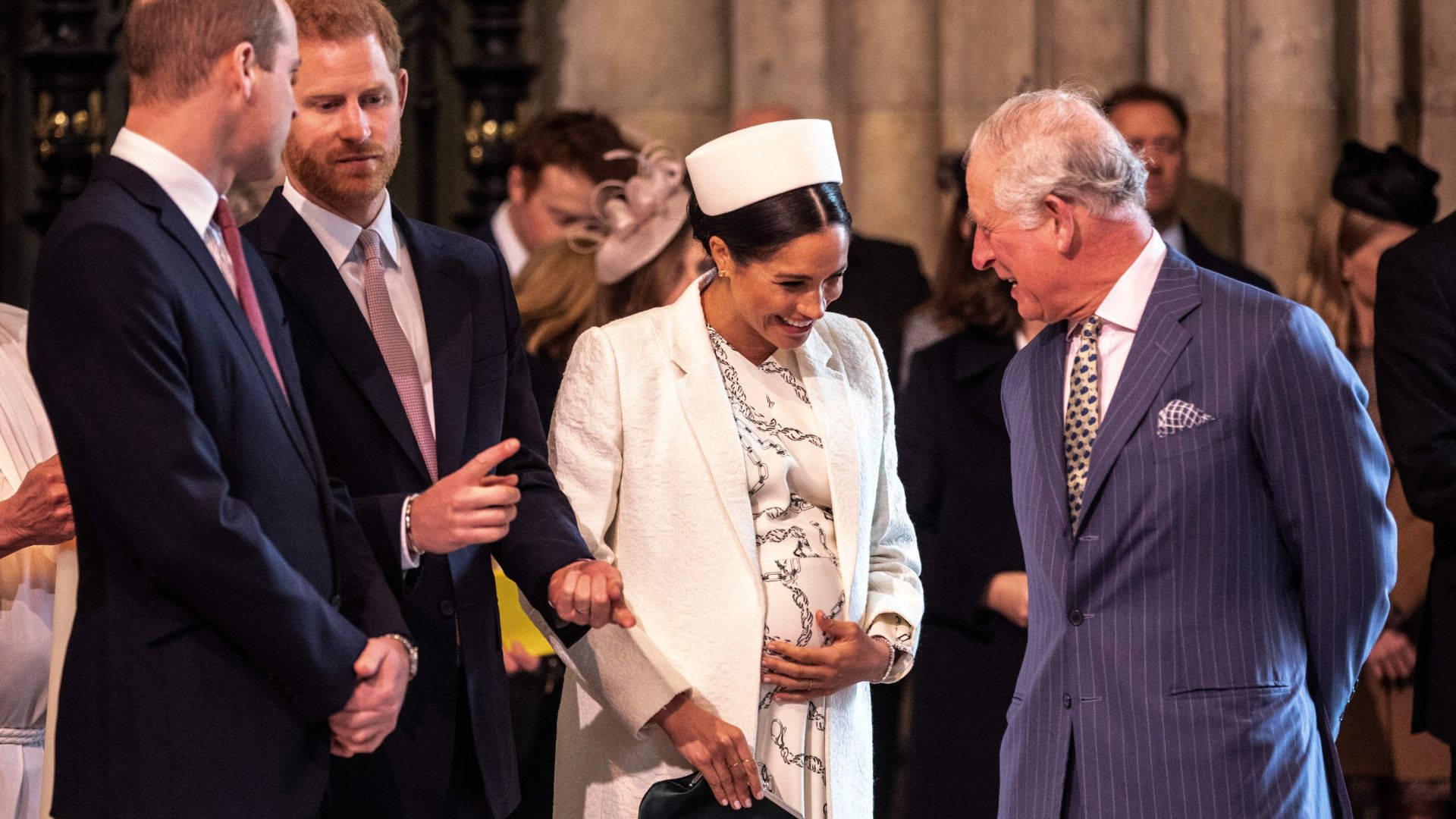Meghan, Duchess of Sussex (2R) talks with King Charles (R) as Prince William (L) talks with Prince Harry, Duke of Sussex, (2L) as they all attend the Commonwealth Day service at Westminster Abbey in London on March 11, 2019