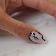 A 3D snake nail design