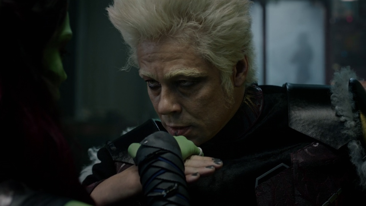 The Collector kissing Gamora's hand