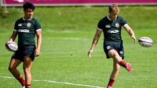 Fin Smith and Marcus Smith practicing kicking in preparation for the Lions tour.