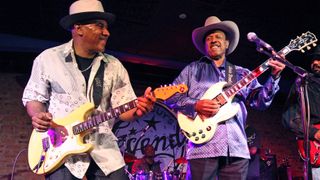 Ronnie Baker Brooks (left) and his father Lonnie Brooks perform with The Brooks Family Blues Dynasty at the Chicago Bluesfest Kickoff Jam at Buddy Guy's Legends on June 6, 2012 in Chicago, Illinois.