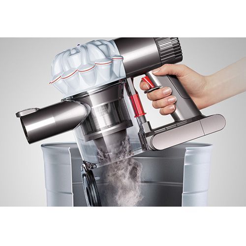 The V6 doubles as a hand vac, and when the dust bin is full, you simply push a button to release dirt and debris.
