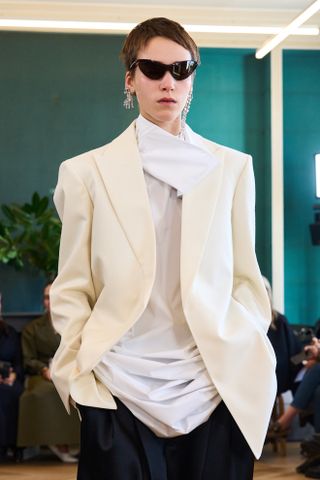 carven draped white blouse and jacket at paris fashion week spring summer 2025