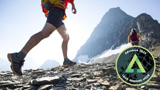 Two people trail running in mountains