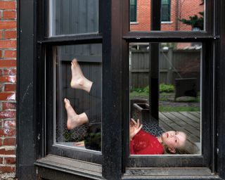 Rania Matar photograph, Lucy, Boston, Massachusetts, 2020 part of On Either Side of the Window: Portraits During Covid-19,