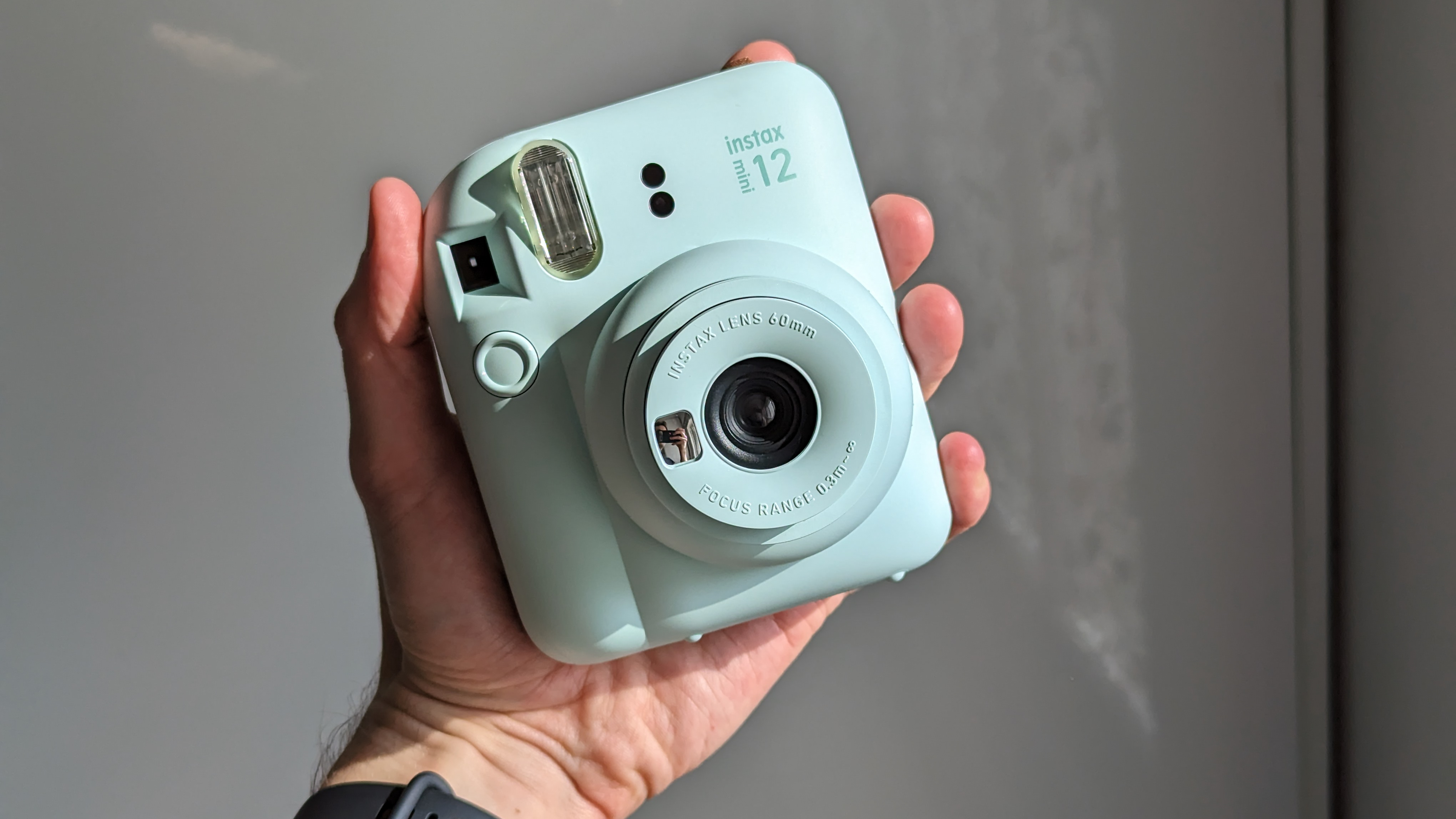 Fujifilm Instax Mini 12 instant camera in green