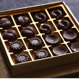 A close up of a box of chocolates