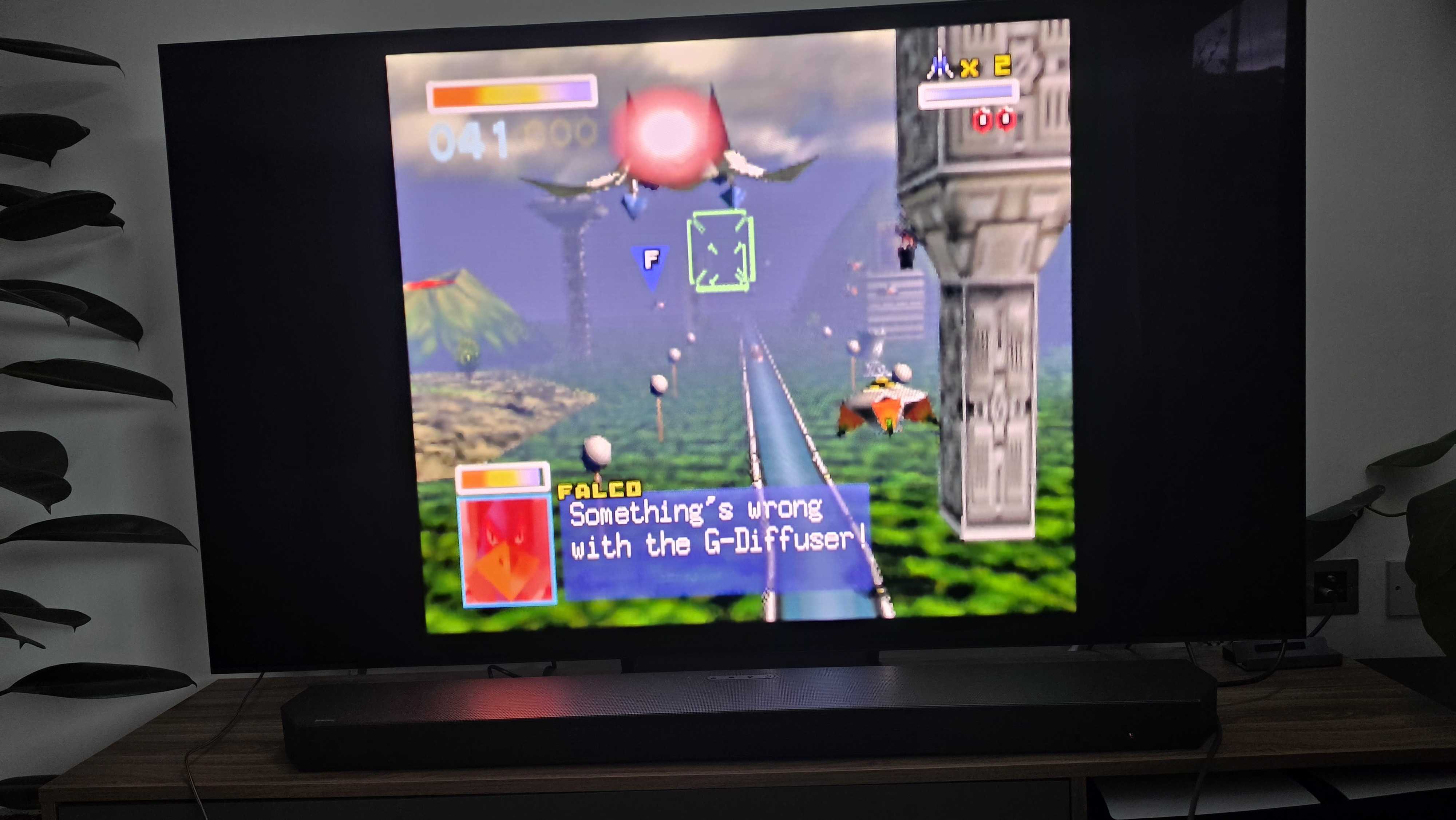 A TV showing some action from Star Fox 64 / Lylat Wars running on the M64.