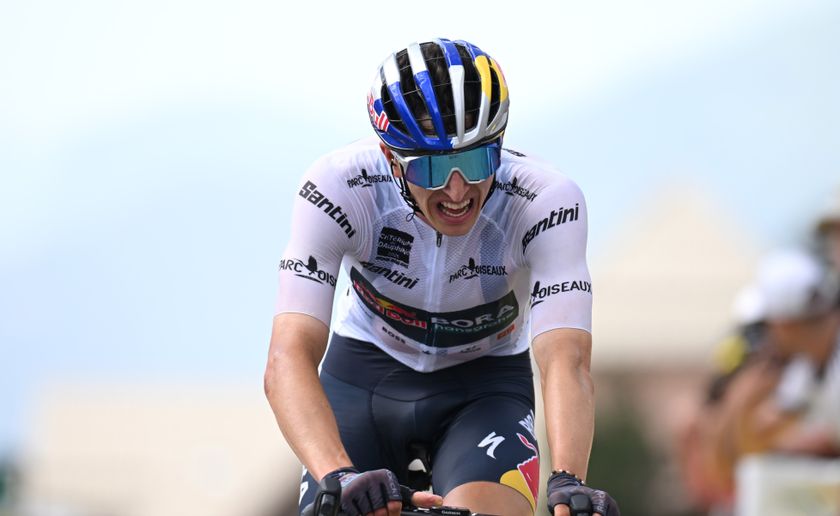 VALMEINIER 1800, FRANCE - JUNE 14: Florian Lipowitz of Germany and Team Red Bull - BORA - hansgrohe- White Best Young Rider Jersey crosses the finish line on third place during the 77th Criterium du Dauphine 2025, Stage 7 a 131.6km stage from Grand-Algueblanche to Valmeinier 1800 (1830m) / #UCIWT / on June 14, 2025 in Valmeinier 1800, France. (Photo by Dario Belingheri/Getty Images)