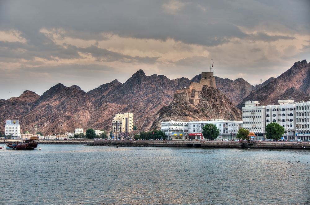 View or the Corniche and Mutrah fort in Muscat, Oman.