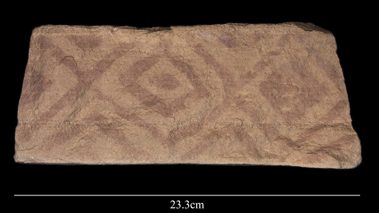 This painting with geometric motifs was found on the platform of one of the mustatils.