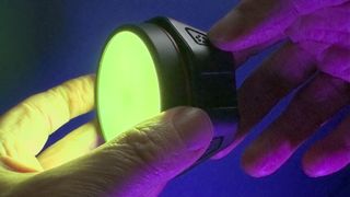 Joby Beamo Reel Color LED held in fingers