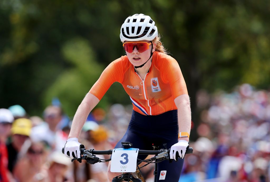 ELANCOURT FRANCE JULY 28 Puck Pieterse of Team Netherlands crosses the finish line during the Womens CrossCountry Cycling Mountain Bike Gold Medal race on day two of the Olympic Games Paris 2024 at Elancourt Hill on July 28 2024 in Elancourt France Photo by Tim de WaeleGetty Images