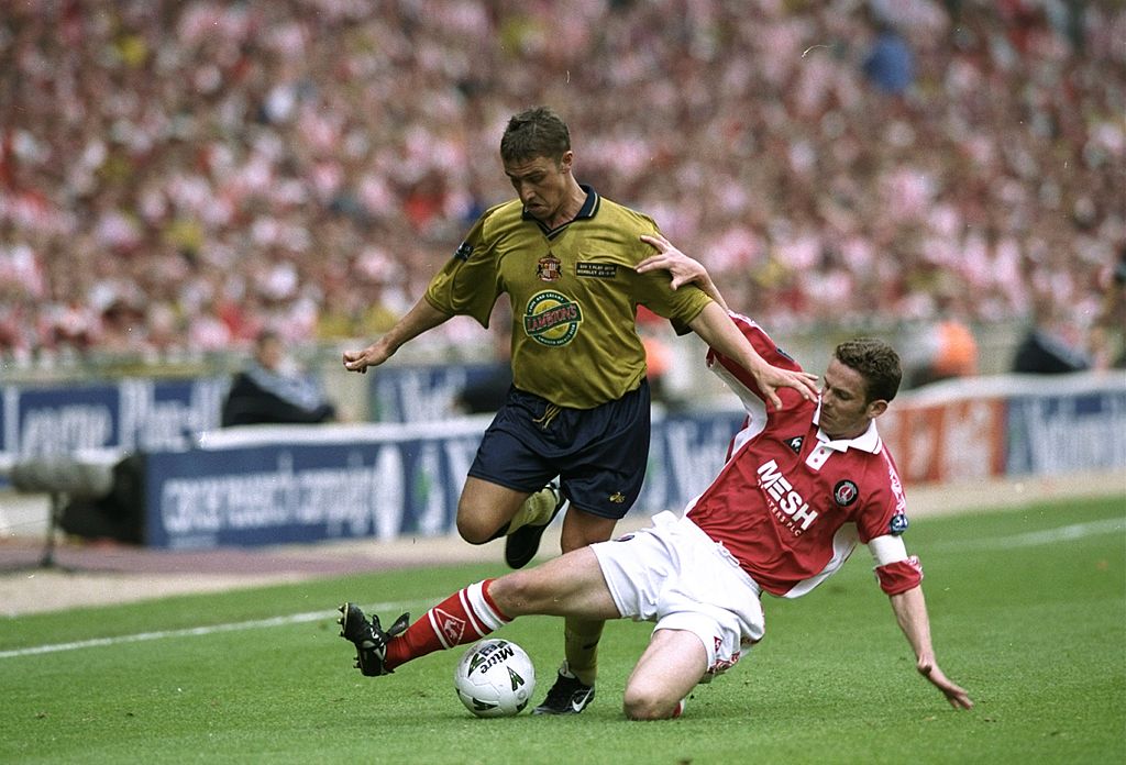 Lee Clark of Sunderland is tackled by Mark Kinsella of Charlton Athletic during the Nationwide League Division One play-off final at Wembley Stadium in London. The match ended in a 4-4 draw after extra time and Charlton Athletic went on towin 7-6 on penaltie