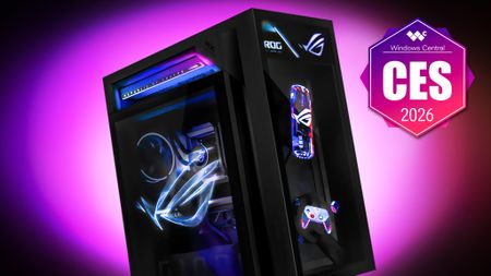ASUS ROG G1000 desktop with holographic images of a soda can, controller, and the ROG logo. 