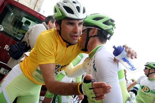Robert Vrecer (Perutnina Ptuj) is congratulated by a teammate.