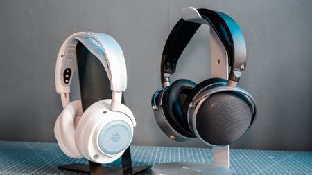 Two pairs of headphones. One, a SteelSeries set with ANC; the other, an Audeze set with great passive sound isolation.