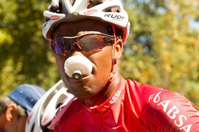 Gugu Zulu re-hydrates at a water point