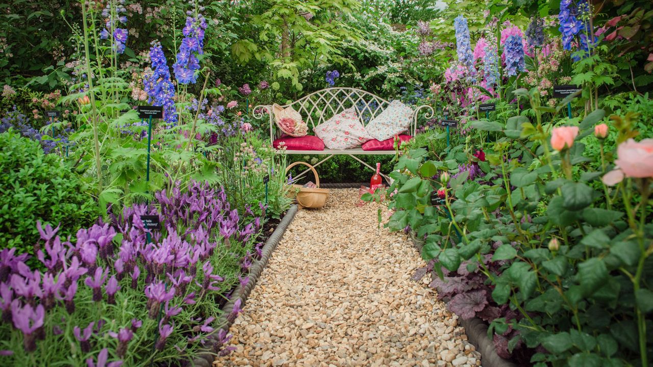 gravel path, bench and flower borders